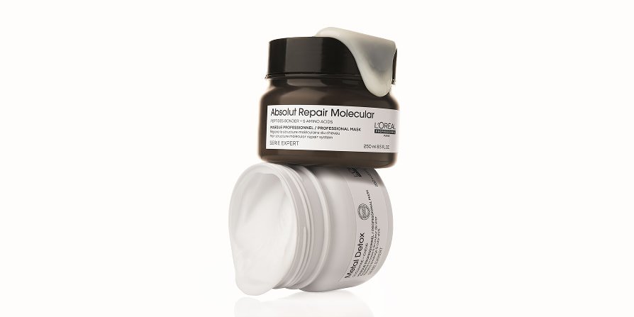 Imagem da embalagem da máscara L’Oréal Professionnel Absolut Repair Molecular Mask, desenvolvida para cabelos danificados a muito danificados, ajudando a reduzir a quebra e a restaurar a força.