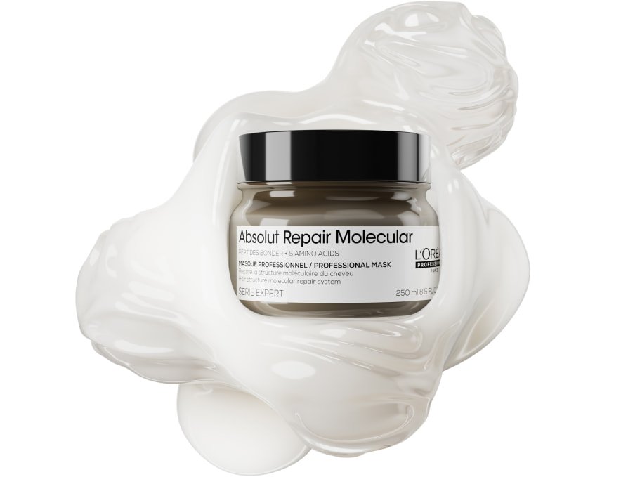 Fotografia da embalagem da máscara capilar L’Oréal Professionnel Absolut Repair Molecular sobre um fundo texturizado, destacando o seu complexo peptídico para restaurar o cabelo danificado.